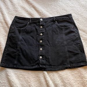 Black buttoned jean mini skirt